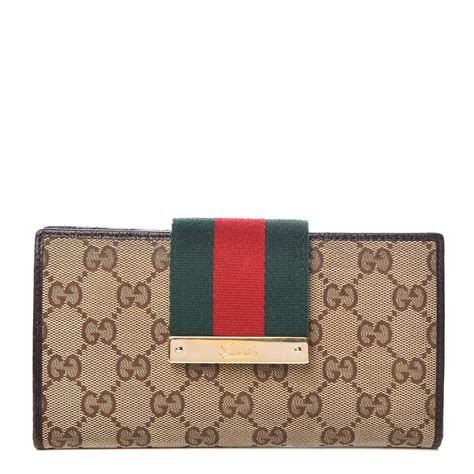 who makes gucci wallets